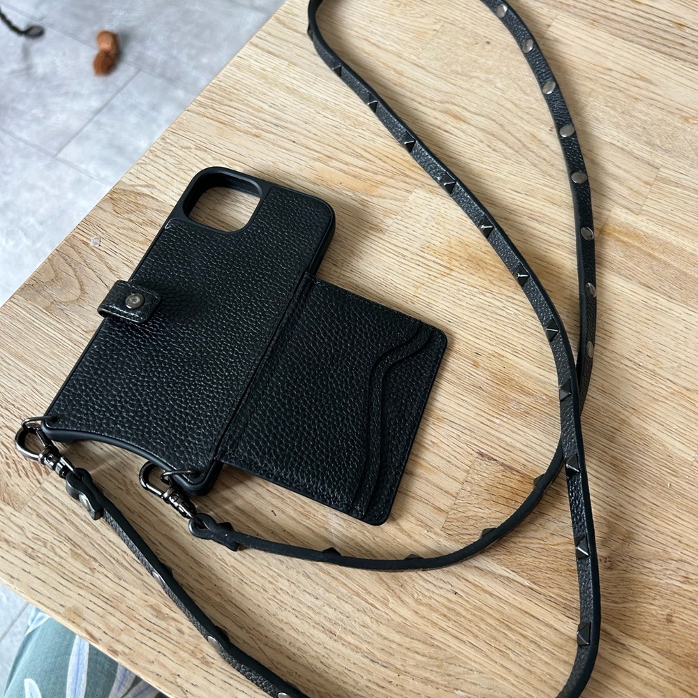 Bandolier Mila MagSafe leather case for iPhone 14, and studded crossbody strap